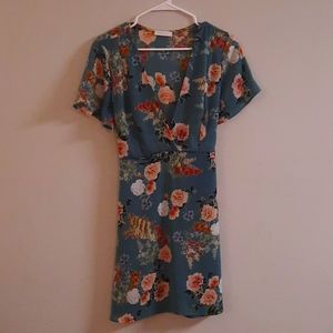 Floral knee length dress with tie belt in back